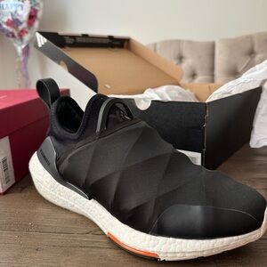 Adidas Men's Black and White Slip-On Sneakers